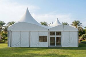 Large white high peak event tent with open entrance and aluminum frame