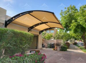 Car Parking Shades Suppliers & Manufacturer in Dubai, UAE - car parking shade fixed on garage wall left side view