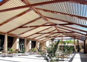 wooden louvered pergola shade design
